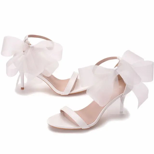 White heels with bows