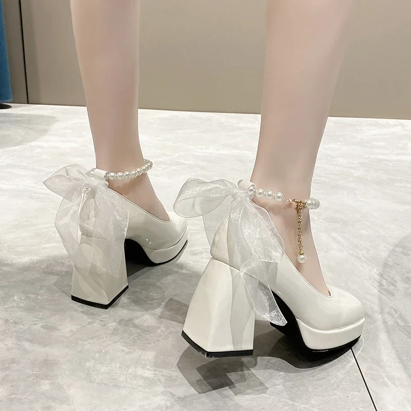 White heels with bows